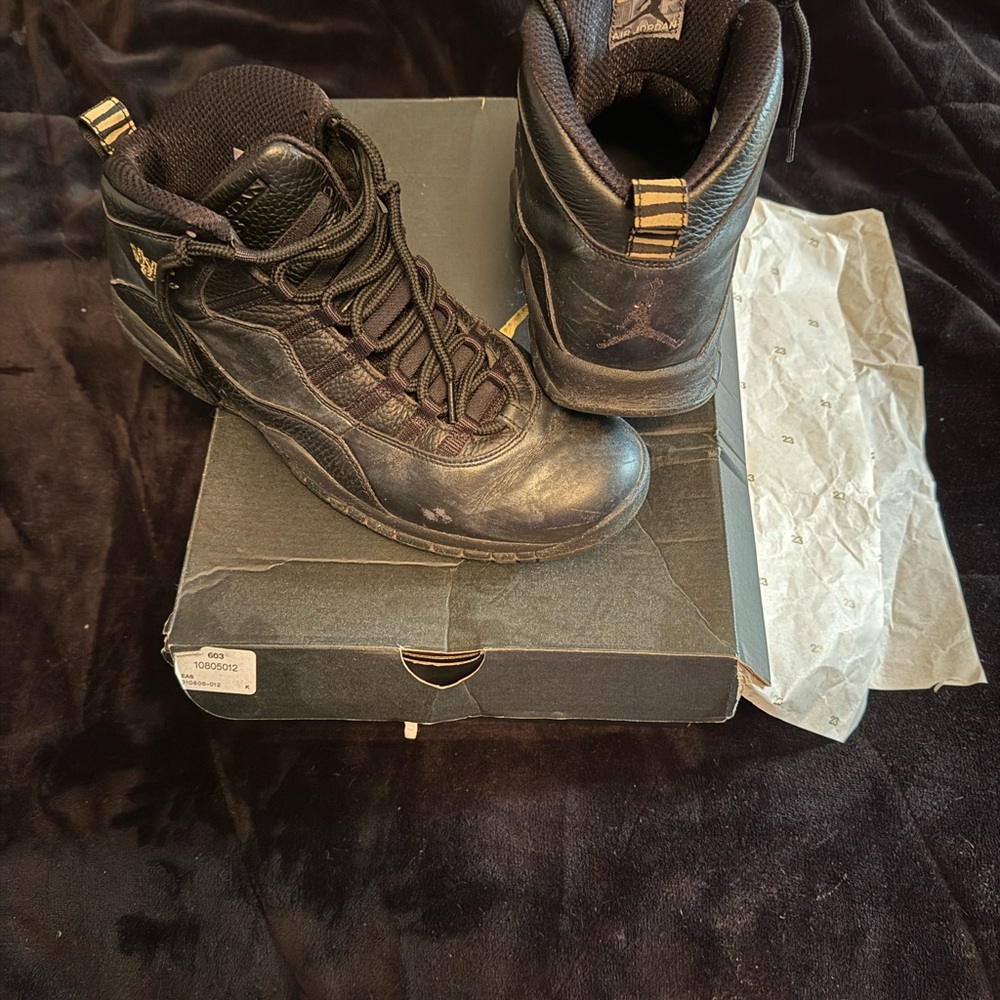 Jordan Black and Gold Sneakers